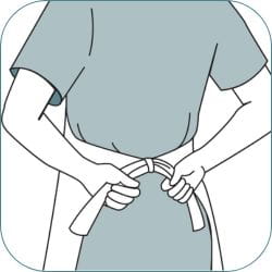 How to don aprons - step 3